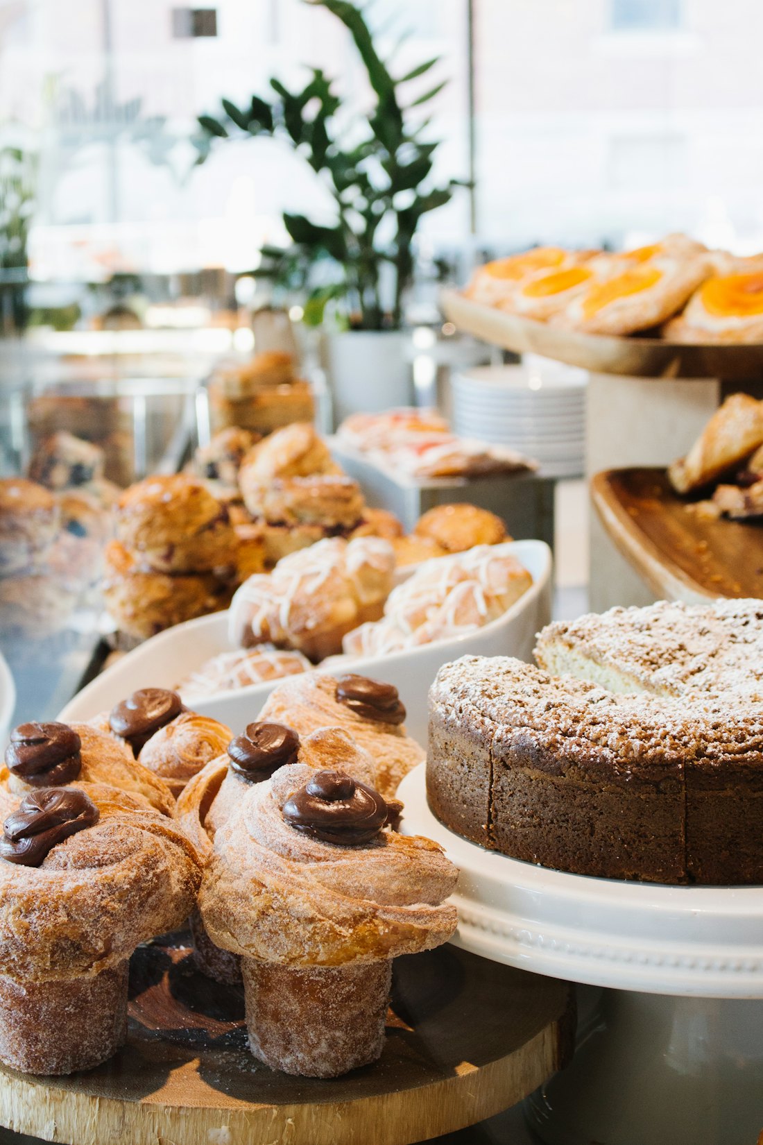 A bakery counter displaying cakes and pastries